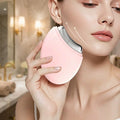 Model using EMS device in luxury bathroom lifestyle scene